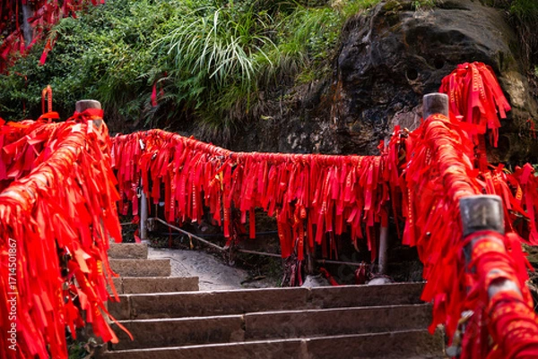 Obraz Red ribbons or strings used as blessing in buddhism