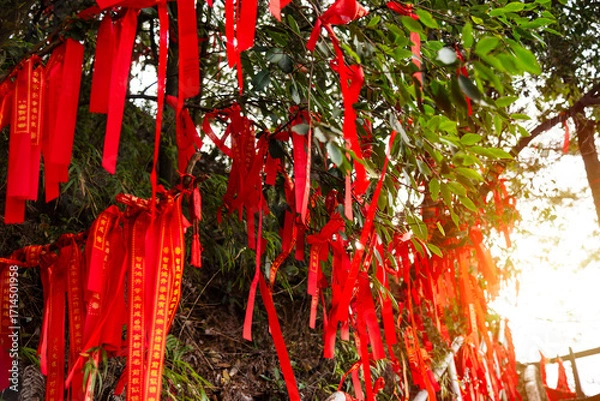 Obraz Red ribbons or strings used as blessing in buddhism