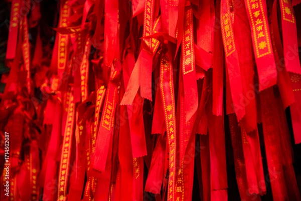 Obraz Red ribbons or strings used as blessing in buddhism