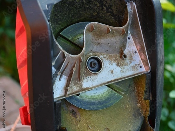 Fototapeta The mechanism of a garden shredder which has been opened