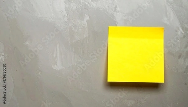 Obraz Yellow sticky note on gray textured surface