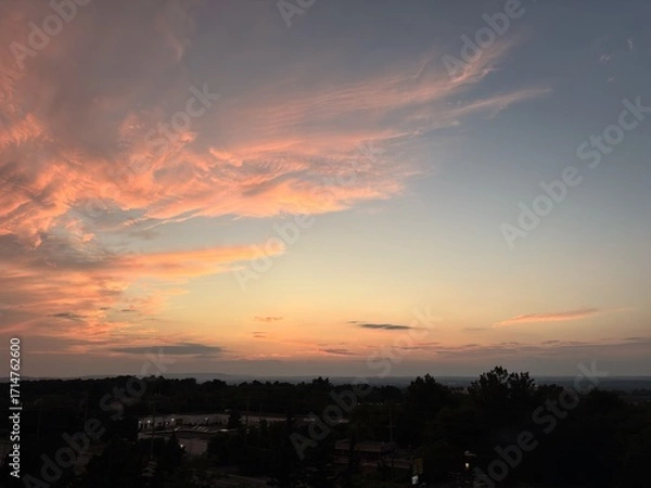 Fototapeta Colourful clouds in the sky at dusk