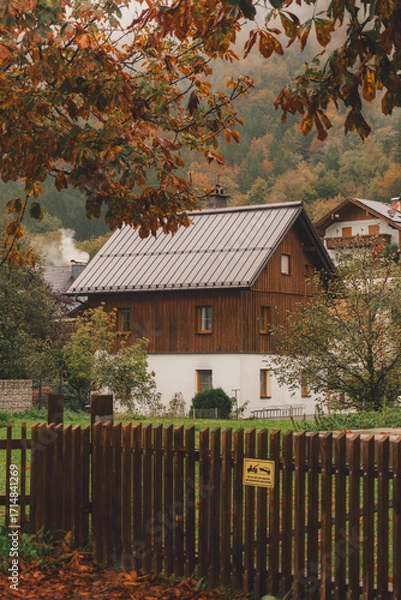 Obraz Autumn landscape of a cottage in a charming alpine village
