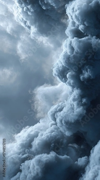 Fototapeta Dramatic and powerful abstract background of dark textured storm clouds in moody sky