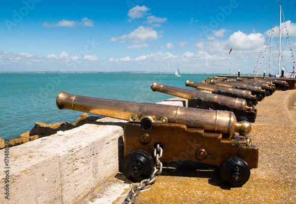 Fototapeta The starting cannons lined up looking out over the Solent during Cowes Week 2017 on the Isle of Wight, England