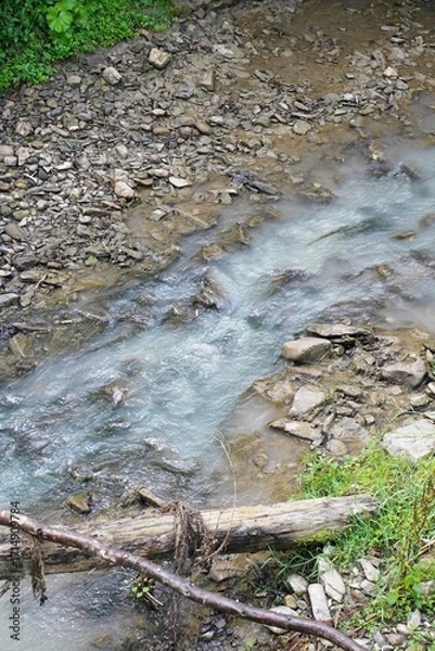 Obraz Mountain stream. A slowly flowing mountain stream