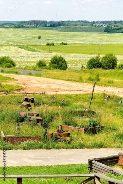 Fototapeta Minsk region, Belarus, July 12, 2025. Rusty military equipment on the Stalin Line.                               