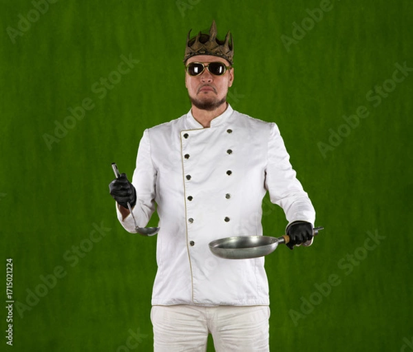 Fototapeta chef with a crown in a white suit on a yellow background