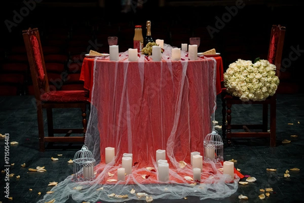 Fototapeta Romantic Dinner Date Setup with Red Decor, Candles, and Roses, Intimate Mood, Stage Background, Valentine's Day, Celebration.