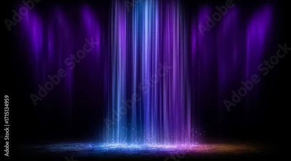 Fototapeta Purple and blue light show with a long purple stream. The light show is in a dark room