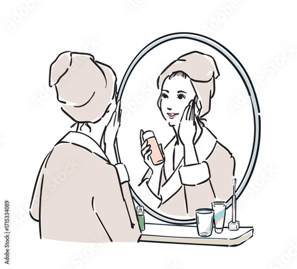 Obraz 鏡の前に立つバスローブ姿の女性　スキンケア