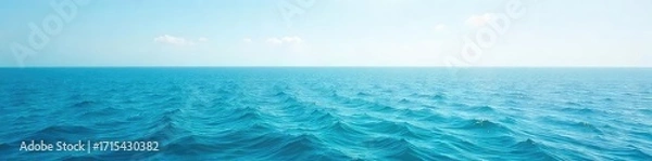 Fototapeta Vast, tranquil ocean stretching to the hazy horizon, a serene seascape under a clear sky Perfect for travel, nature, and serenity themes , scenery, water, blue sky