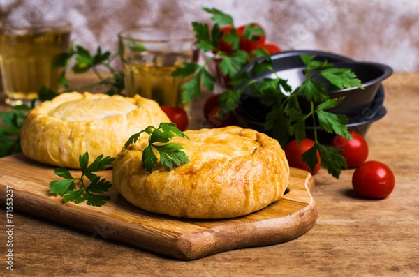 Obraz Round meat pie with vegetables