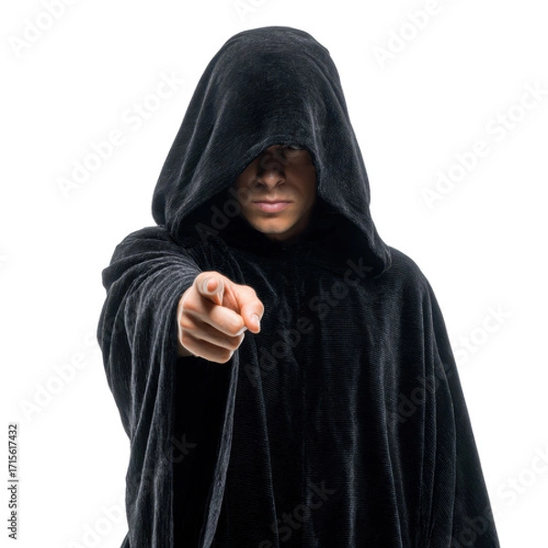 Fototapeta Mysterious Figure in Dark Cloak Pointing at Viewer with Intensity
