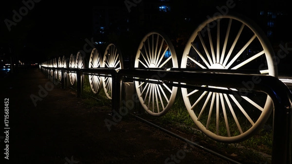 Fototapeta 자전거바퀴 모양 울타리 조명