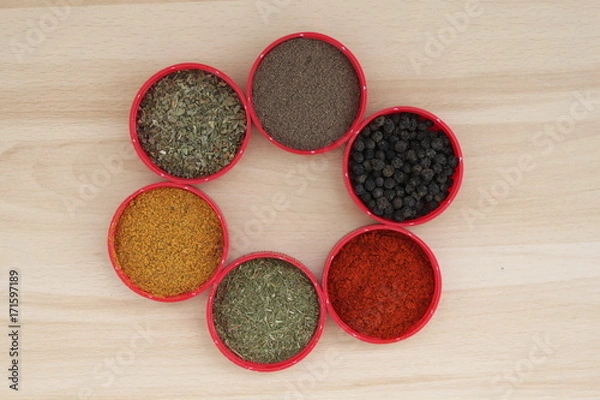 Obraz Тhere are spices on the wooden desk 