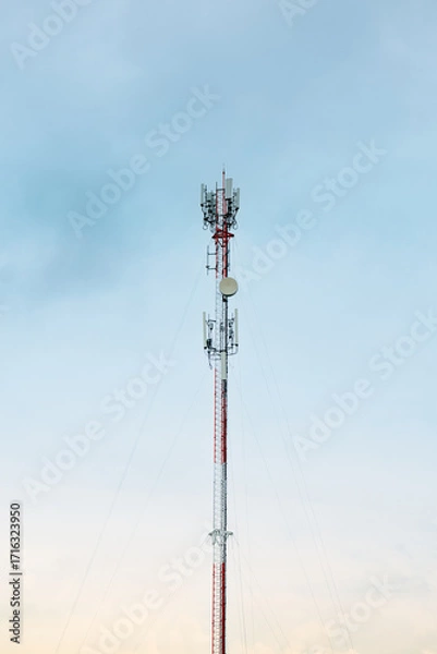 Fototapeta Signal tower or Mobile phone tower .Global connection and internet network concept.on blue sky,Telecommunication tower.