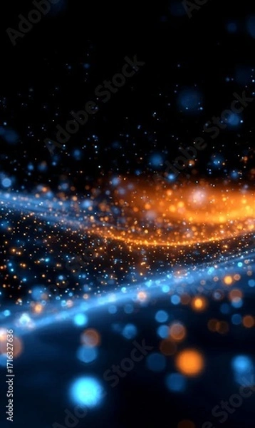 Fototapeta Abstract digital particles flowing in waves with glowing blue and orange lights against a dark background