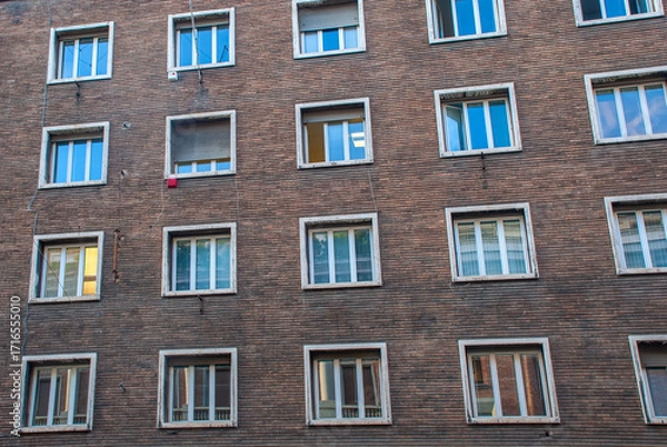 Obraz Brick Facade with Patterned Windows in Rome, Italy
