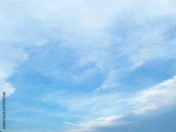 Fototapeta Beautiful clouds during spring time in a Sunny day. Blue sky and white fluffy clouds