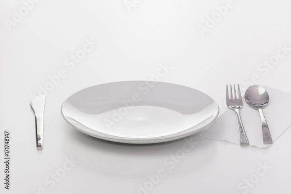 Obraz White empty plate. Isolated on white background
