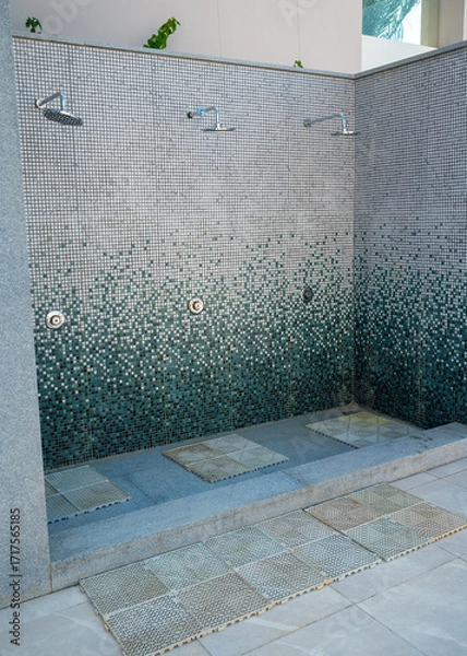 Obraz Outdoor showers near holiday resort pool