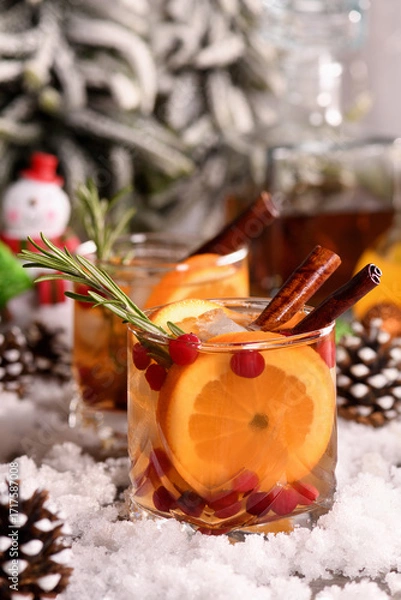 Fototapeta  Winter Bourbon smash Cocktail. Enjoy a fragrant drink on a winter evening. Christmas party