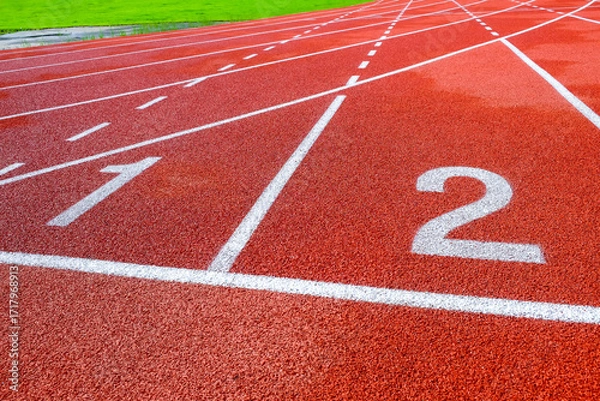 Fototapeta Running track with numbers in the stadium, sport background.