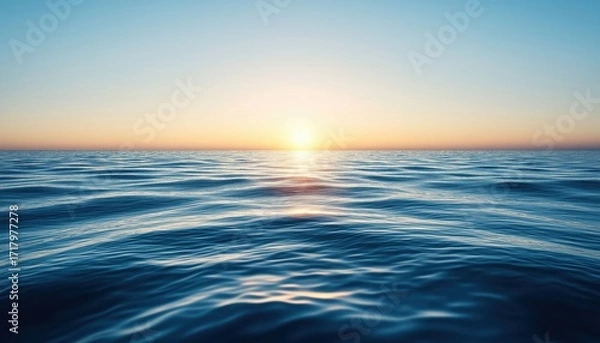 Fototapeta Tranquil Scene: Clear Sky, Calm Sea At Sunrise. Reflective Water Surface For Product Display. Serene Background With Mockup.