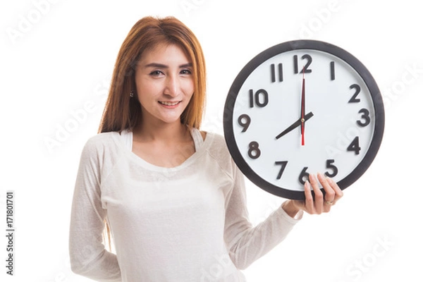 Obraz Young Asian woman with a clock.