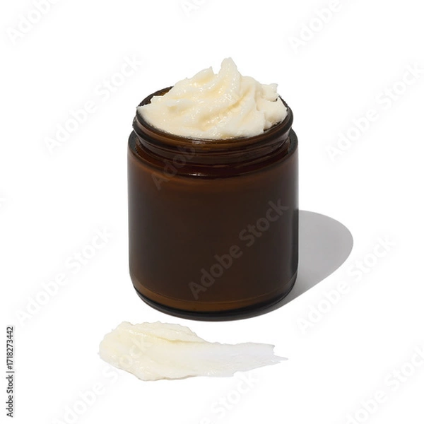 Fototapeta Whipped beef tallow skincare in amber jar on white background with texture