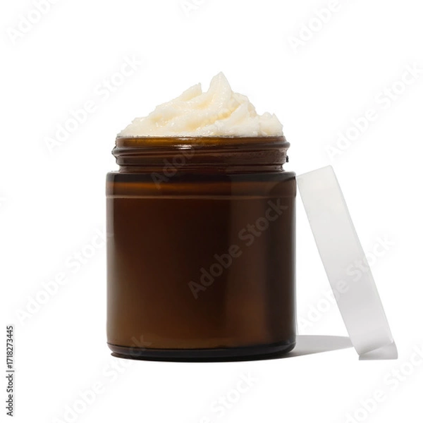 Fototapeta Whipped beef tallow skincare in amber jar on white background with texture