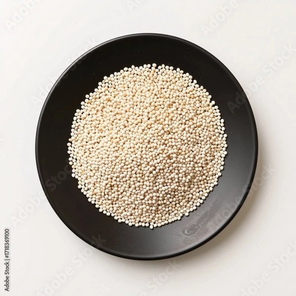Obraz White Grains in Black Plate Beautiful Background for Culinary Art
