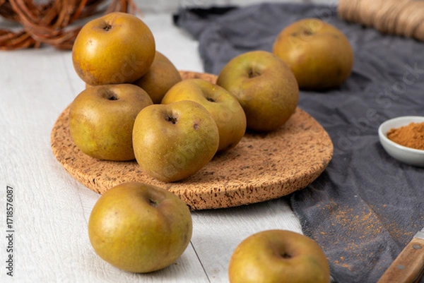 Fototapeta Autumn still life with apples and cinnamon