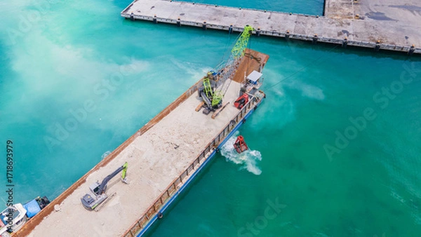 Fototapeta Marine Dredging Barge with Crane Excavating Seabed Soil