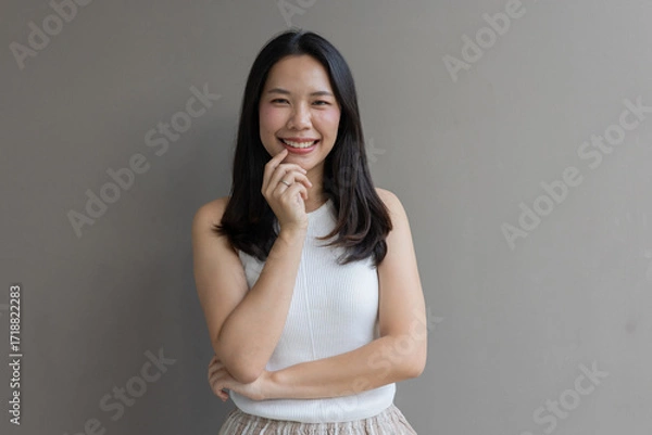 Fototapeta close up beautiful asian woman smile and beauty teeth and happy feeling on gray color background for veneer and invisalign treatment concept