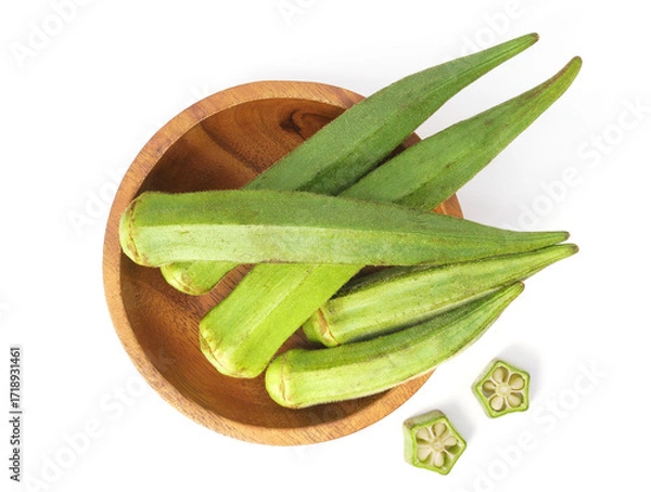 Fototapeta Fresh okra in wooden bowl isolated on white background