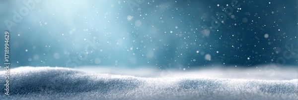 Fototapeta Snow gently falling on a pristine layer of fresh snow creates a magical winter wonderland, ideal for christmas and winter themed projects, evoking a serene and festive atmosphere