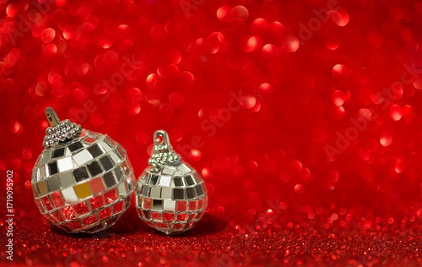 Obraz Christmas disco balls on red bokeh background