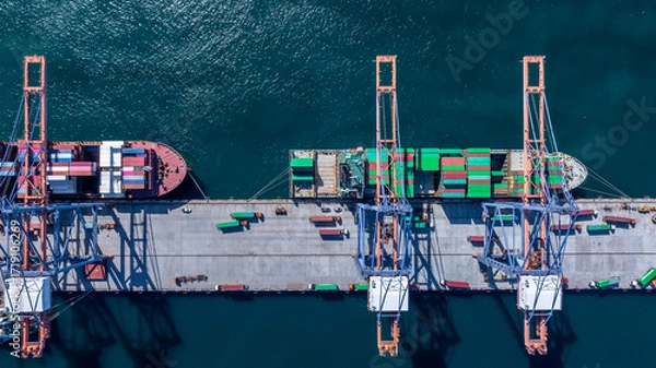 Fototapeta Aerial view container cargo ship international port terminal with gantry crane, Global business import export logistic maritime transport by container cargo ship vessel, Container ship cargo freight.