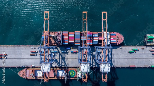 Fototapeta Aerial view container cargo ship international port terminal with gantry crane, Global business import export logistic maritime transport by container cargo ship vessel, Container ship cargo freight.
