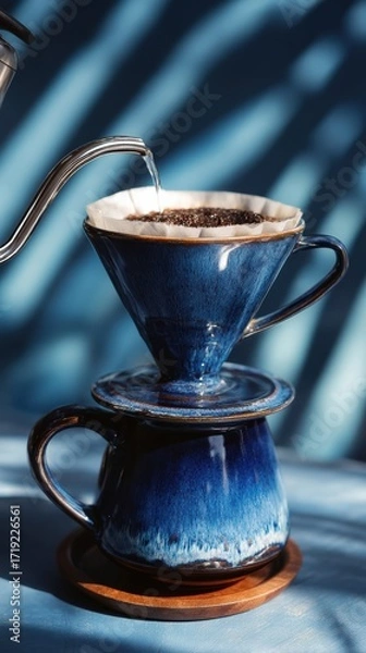 Fototapeta Pourover coffee brewing with gooseneck kettle in rustic kitchen