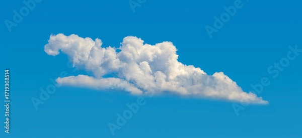 Fototapeta Isolated cascading cloud floating in the wind against blue sky. Big glowing clouds spreading on the deep blue sky sunny day. Nature concept background. Elegant landscape image
