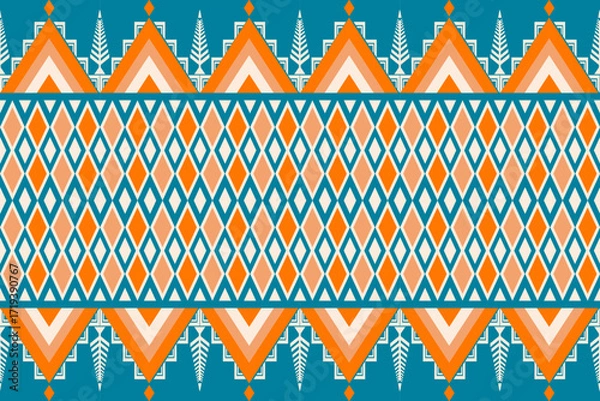 Fototapeta Colorful geometric ethnic seamless pattern with traditional tribal ornaments in orange, teal, and white. Perfect for textile design, fabric prints, wallpapers, and decorative backgrounds.