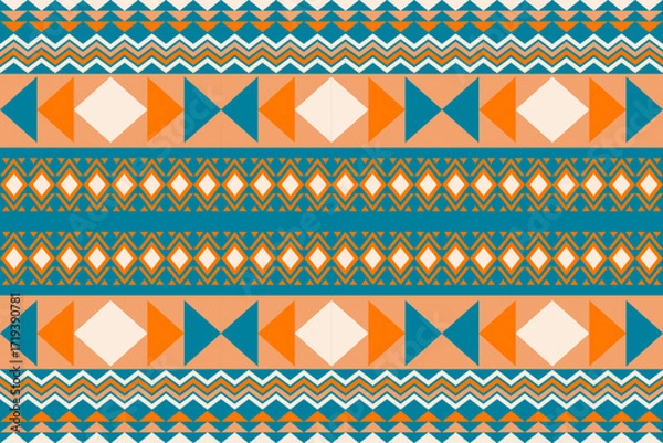 Fototapeta Colorful geometric ethnic seamless pattern with traditional tribal ornaments in orange, teal, and white. Perfect for textile design, fabric prints, wallpapers, and decorative backgrounds.