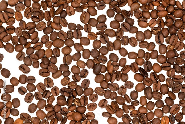 Fototapeta Freshly roasted coffee beans isolated on white background. coffee texture close-up, top view.