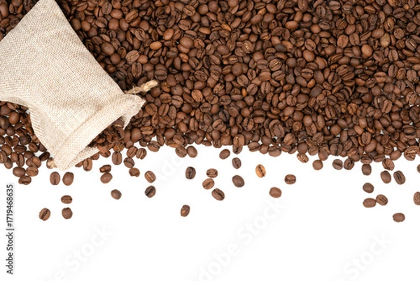 Fototapeta Roasted coffee beans in a jute bag isolated on white background. Coffee beans background texture.