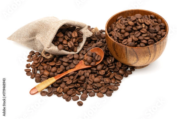 Fototapeta Roasted coffee beans in a jute bag with wooden cup and spoon isolated on white background. Coffee beans background texture.