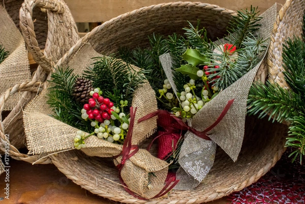 Obraz Christmas bouquets with fir branches in a wicker basket