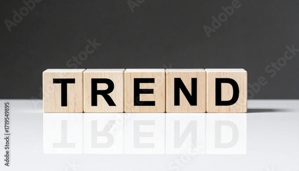 Obraz 流行を表す英語のフレーズTRENDの文字が書かれたキューブブロック。 aiで生成	
